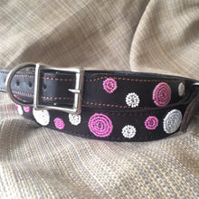 Load image into Gallery viewer, The Her Best Foot Forward Petunia Pink Beaded Dog Collar is a handmade Maasai ethical pet accessory from East Africa, featuring black leather, pink and white bead patterns, and a silver buckle.