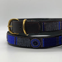 Load image into Gallery viewer, The Mia Beaded Dog Collar by Her Best Foot Forward is a chic handmade Maasai ethical accessory from East Africa, featuring intricate blue, black, and silver beadwork plus a gold buckle and D-ring, crafted by women artisans.
