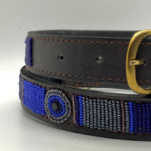Load image into Gallery viewer, A close-up of the Mia Beaded Dog Collar by Her Best Foot Forward—a dark brown leather collar with a gold buckle and blue, purple, black, and white Maasai beadwork. Chic, handmade, and ethically crafted by women artisans in East Africa.