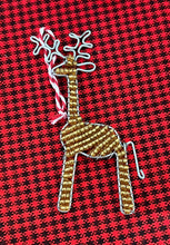 Load image into Gallery viewer, Reindeer Friends by Her Best Foot Forward are handcrafted beaded holiday ornaments from Tanzania, featuring wire and gold beads with a candy cane loop for hanging—perfect for African-inspired holiday decor.