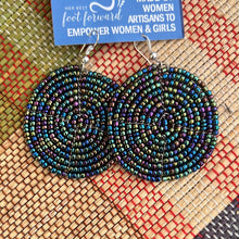 Load image into Gallery viewer, A pair of Duara Circular Beaded Earrings by Her Best Foot Forward rests on a woven surface. Handmade Maasai statement jewelry from East Africa, these African beaded earrings empower women and girls with every purchase.